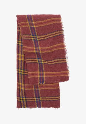 Czerwony, w kratę szalik wykonany z miękkiego, teksturowanego materiału, z żółtymi i niebieskimi paskami wplecionymi w tkaninę, z postrzępionymi brzegami dla dodatkowego efektu.