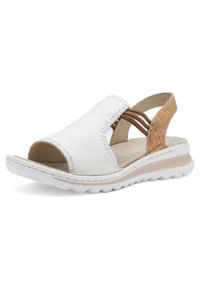 White leather open-toe sandal with beige cushioned sole, brown elastic side straps, and textured tan heel strap.