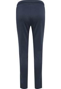 Marinblåa träningbyxor med en slät yta, elastisk midja och design med smalnande ben, som har en ren och minimalistisk bakvy.