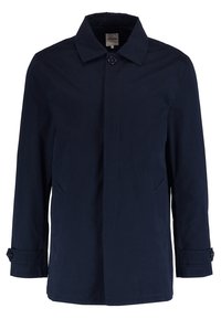 Laivastonsininen takki, joka on valmistettu kevyestä kankaasta. Siinä on kaulus, kaksi sivutaskua ja napilliset kalvosimet, ja sen muotoilu on siisti ja minimalistinen.