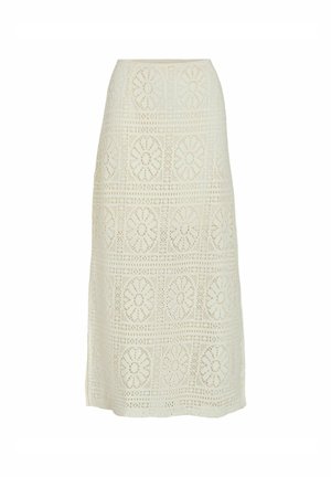 Blonde midi-nederdel i lysecreme med blomsterudskæringer, tætsiddende talje og lige silhuet. Blød tekstur og fin detaljer.