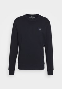 Navyblauwe sweatshirt van een katoenmix, met een ronde hals, lange mouwen, ribgebreide manchetten en een klein logopatch op de borst.