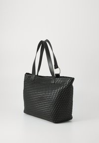 Black woven leather tote bag with two flat shoulder straps, rectangular shape, textured surface, and a subtle sheen. Silver hardware accent.
