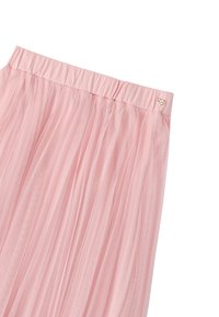 Gonna di tulle rosa con una morbida vita elastica. Presenta pieghe verticali e un piccolo accento a forma di cuore argentato sulla vita. Leggera e trasparente.
