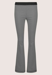 Zwart-witte flared leggings met een visgraatpatroon, voorzien van een stevige zwarte tailleband voor comfort en een nauwsluitend ontwerp.