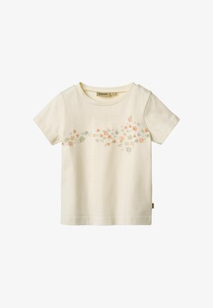 T-shirt di cotone color crema con ricami floreali in rosa chiaro, blu e verde. Maniche corte e scollatura rotonda.