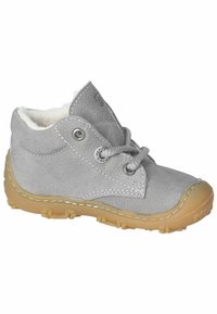Graue Lederstiefeletten mit einem flauschigen Futter, runden Ösen, grauen Schnürsenkeln und einer gummierten Sohle mit strukturiertem Profil.