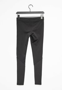 Svarta leggings gjorda av stretchigt material, med hög midja och vinklade sidloskanter för en åtsittande design. Lämpliga för aktiv träning.
