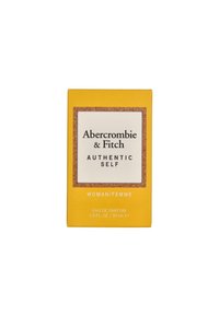 Gelbe rechteckige Parfümverpackung mit einem weißen Etikett, das schwarzen Text und einen Korkrand aufweist. Enthält 30 mL Eau de Parfum.