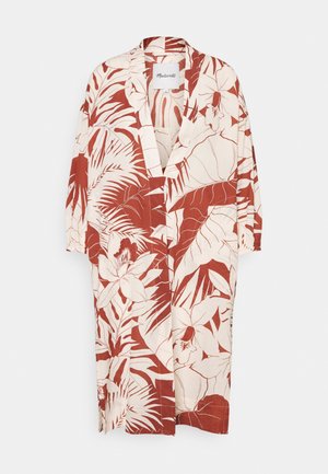 Robe à manches longues, longueur genou, imprimé floral tropical rouille et blanc, col en V et coupe décontractée.