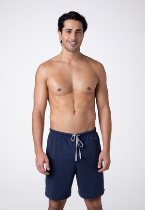 Pantaloni da bagno blu navy con vita elastica e coulisse grigia. Tessuto morbido, lunghezza fino al ginocchio e design a vestibilità comoda.