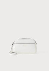 White leather crossbody bag, rectangular shape, smooth texture, zip closure, adjustable strap, minimalistic design with embossed logo.