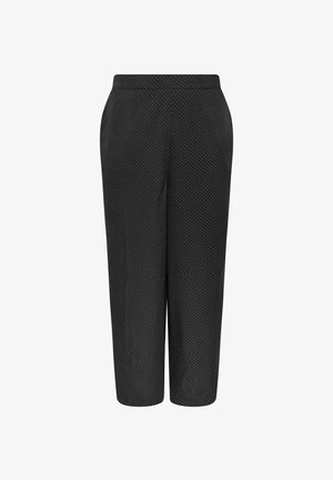 Pantalons noirs courts avec un motif à pois, taille élastique, poches latérales et une texture de tissu lisse.