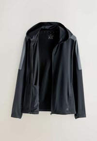 Musta hupullinen takki, jossa on vetoketjusuljenta, sileä kangas, kontrastiväriset olkapääpaneelit ja sivutaskut. Yksinkertainen muotoilu ilman näkyviä kuvioita.