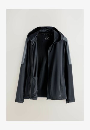 Must kapuutsiga jakk, millel on tõmblukuga sulgemine, sile kangas, kontrastsed õlapaneelid ja küljetaskud. Lihtne disain ilma nähtavate mustriteta.