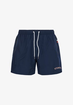 Costume da bagno blu navy con cordino bianco, tasche laterali con cerniera, dettaglio a righe sui bordi delle tasche e logo "ICEBERG" sulla gamba sinistra.