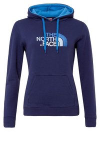 Granatowy hoodie z niebieskim wnętrzem kaptura, kieszenią kangurką, ściągaczami i logiem "THE NORTH FACE" w białym i niebieskim kolorze na froncie.