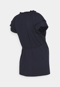 Navy blue short-sleeve top featuring a smocked neck, soft fabric, loose fit, and a fitted waistband with a subtle gathered detail at the back.