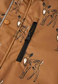 Brown jacket featuring deer prints, zip pocket, and contrasting orange button. Material has a smooth texture with a water-resistant finish.