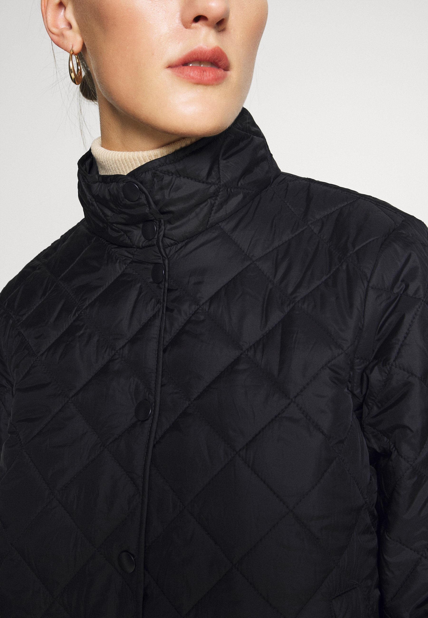 black quilted blazer