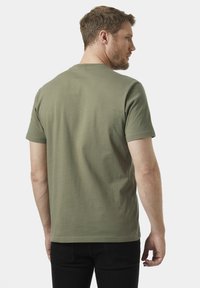 Helly Hansen HH BOX - Triko s potiskem - lav green