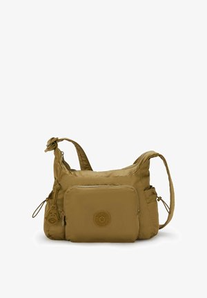 Khaki ramenní taška s jemnou nylonovou texturou, přední kapsou na zip, nastavitelným popruhem a pryžovým logem. Obsahuje pouzdro s přívěskem.