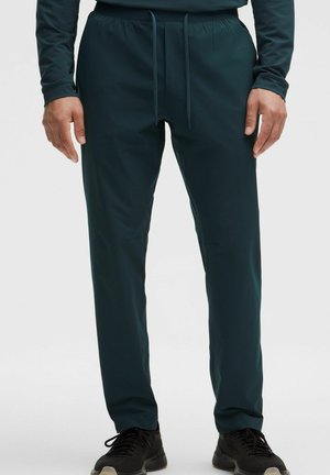 REGULAR - Pantalones deportivos - indochine blue-028022