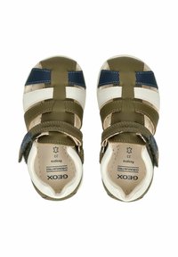 Zelené a námořnické sandály s bílými pruhy, vyrobené z umělého materiálu. Mají suchý zip a polstrovanou stélku. Velikost 23.