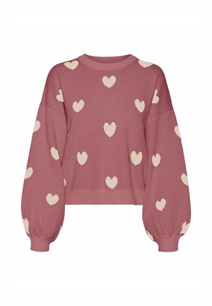 Roze gebreide trui met oversized, pofmouwen. Versierd met crèmewitte hartpatronen verspreid over de trui. Ribgebreide ronde halslijn en zoom.
