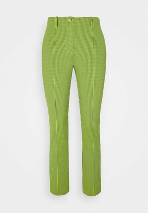 Slim-fit neon green pants with black micro-check pattern, front button, belt loops, and pressed creases down the legs.