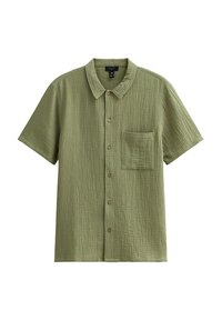 Camicetta verde a maniche corte con un design testurizzato e stropicciato, chiusura con bottoni e taschino sul petto. Realizzata in un tessuto leggero.