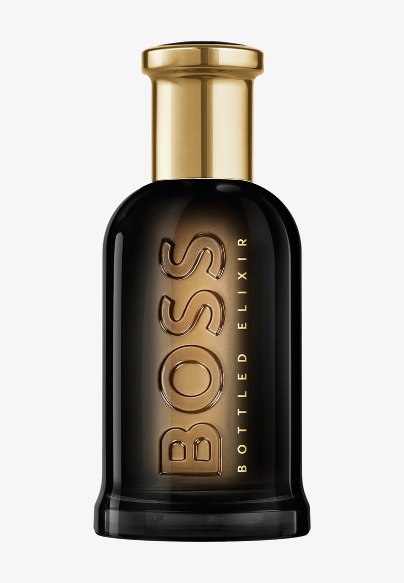 Schwarze Glasflasche mit einem goldfarbenen Farbverlauf als Akzent. Mit auffälliger "BOSS"-Beschriftung und einem goldenen Verschluss. Schlanke, zylindrische Form.