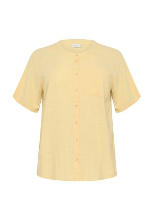 Light yellow short-sleeve shirt, made of linen, featuring a round neckline, a button front, and a left chest pocket. Smooth, breathable texture.