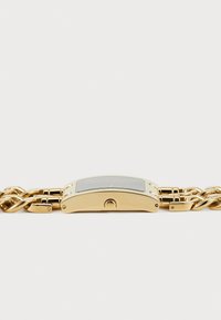 Gold-tone wristwatch with a rectangular face, a black dial, and a chunky chain link bracelet. Features a small crown and polished finish.