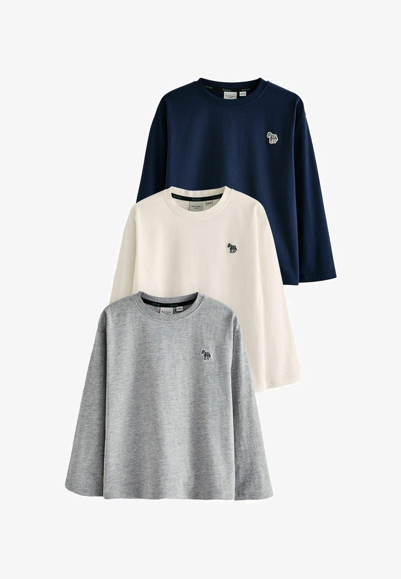 Három hosszú ujjú póló látható: sötétkék, fehér és szürke. Mindegyiken egy apró hímzett zebra logó található a mellrészen. Puha anyagú.