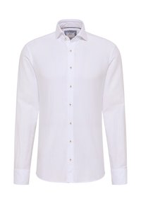 Witte langsleevenshirt van linnen, met een knoopsluiting aan de voorkant, een ronde zoom en contrasterende lichtbruine knopen.