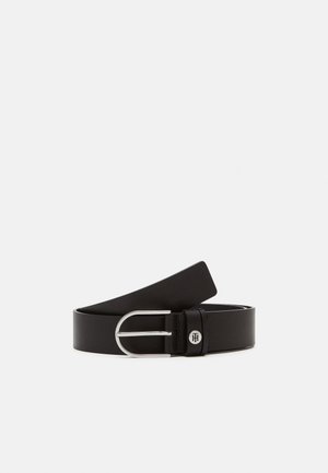 Black leather belt with silver rounded buckle and small circular logo on belt loop, displayed coiled on a white background.