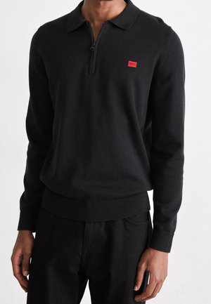 Stickad tröja - black
