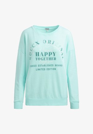 Mint green sweatshirt with long sleeves, relaxed fit, featuring graphic text designs in varying fonts in white and silver. Ribbed cuffs and hem.