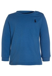 Blue long-sleeve shirt made of cotton with a crew neckline. Features a small, dark logo on the chest and ribbed cuffs.