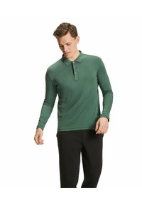 Langärmliges Polo-Shirt in Dunkelgrün, aus glattem, dehnbarem Stoff gefertigt. Mit einem Kragen, einer 3-Knopf-Leiste und tailliertem Design.