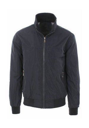 Giacca leggera nera con colletto alla coreana, cerniera frontale, due tasche laterali con cerniera, polsini ed elastico in vita.