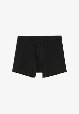 Schwarze Boxershorts aus weichem Stoff, mit einem elastischen Bund und eingeprägtem Branding. Einfaches, klassisches Design ohne Muster.
