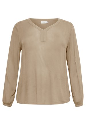 Blouse beige à manches longues avec un col en V et une coupe décontractée. Fabriquée en tissu léger avec une texture subtile. Présente des poignets froncés.