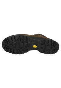 Botte de randonnée marron avec une semelle extérieure en caoutchouc noir. Semelle à profondeurs pour une bonne adhérence, avec une touche de jaune et une conception robuste pour une utilisation en extérieur.