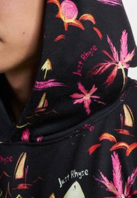 Black hoodie with vibrant pink and orange tropical designs, including sails and palm trees, featuring the text "Just Rhyse" in multiple locations.