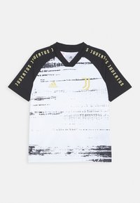 Juventus Jugend Fußballtrikot mit einem schwarz-weißen gestreiften Design. Schwarze Ärmel, V-Ausschnitt, goldene Akzente und Adidas-Logo auf der Vorderseite.