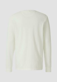 Langärmelig shirt in off-white, gemaakt van wafelkatoen, gezien vanaf de achterkant, met geribbelde manchetten en een ronde hals.