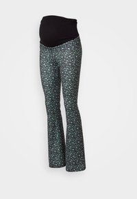 Leggings de maternité évasés avec une taille noire et un motif sombre orné de petites fleurs vert menthe. Fabriqués en tissu doux et extensible.