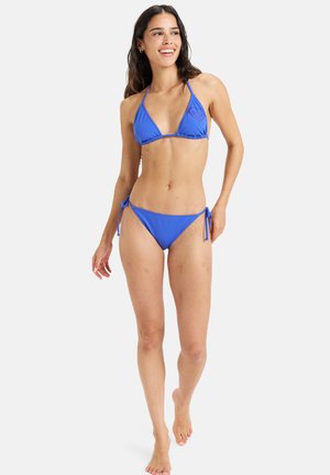 Blue bikini set featuring a triangle top with thin straps and knotted side ties on the bottoms, made of smooth, stretchable fabric.